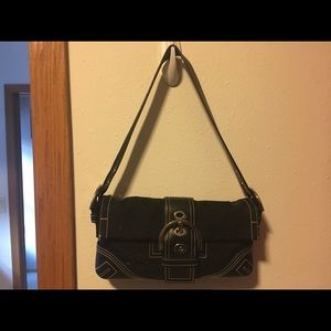 Small, classic Coach purse